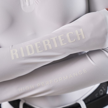 Polo de compétition femme Equestro Ridertechnology à manches longues et zip